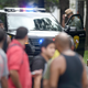 Maryland State Police stand near the perimeter of a scene where a shooting took place in Aberdeen, Md. on Sept. 20, 2018.
